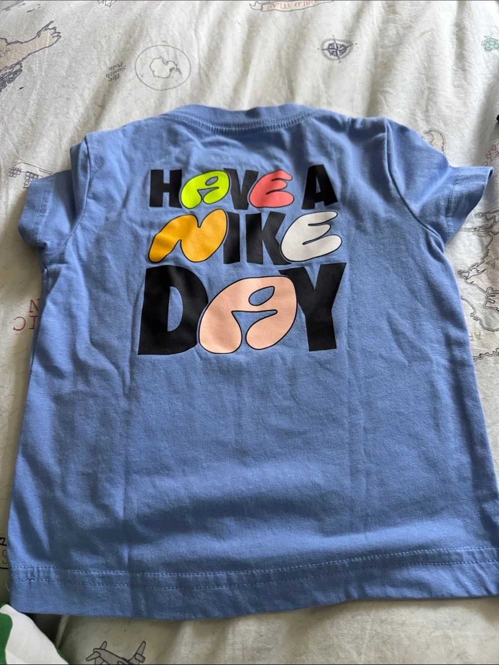 Nike Light Blue Kids' Short Sleeve Tee with Neon Yellow Swoosh Accent